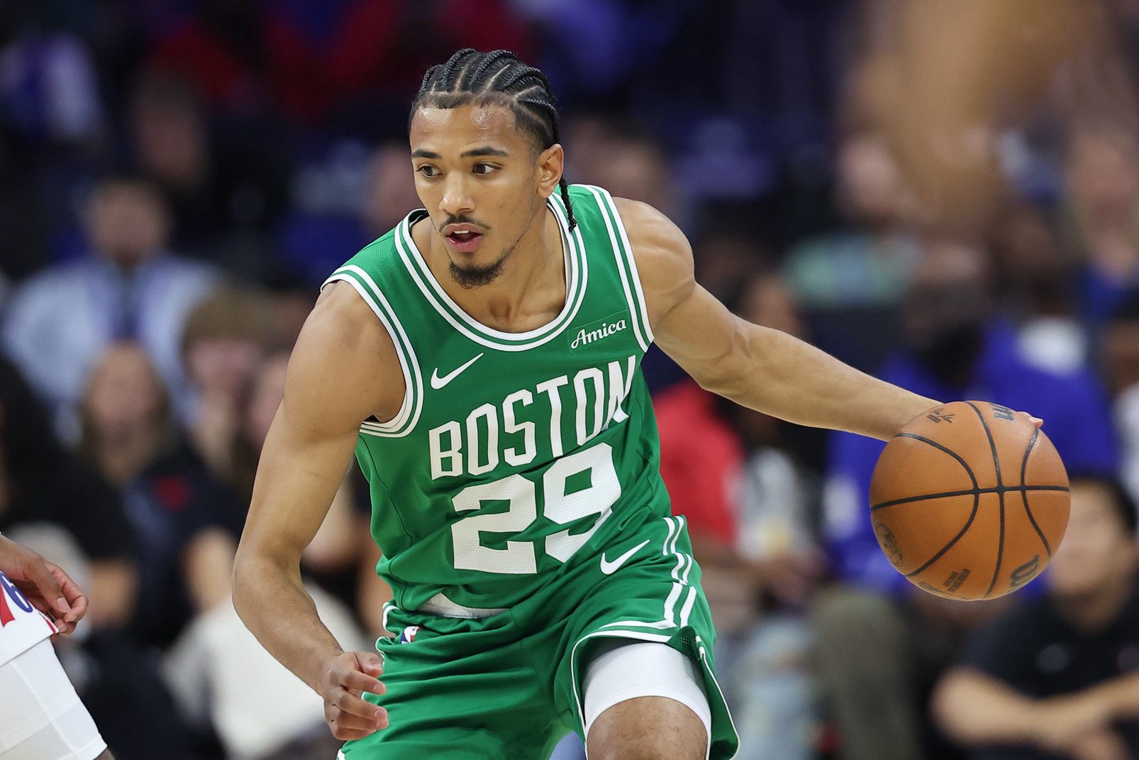 Oct 16, 2026; Philadelphia, Pennsylvania, USA; Boston Celtics guard Milos Uzan (29) dribbles against the Philadelphia 76ers during the third quarter at Xfinity Mobile Arena. Mandatory Credit: Bill Streicher-Imagn Images