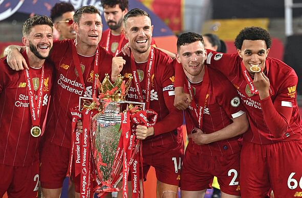 Liverpool's English midfielder Jordan Henderson, Liverpool's Scottish defender Andrew Robertson and Liverpool's English defender