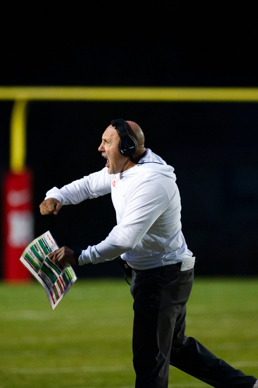 Heritage head football coach Joe Osovet yells during a football game at Heritage high school on Thursday, Oct. 19, 2023.