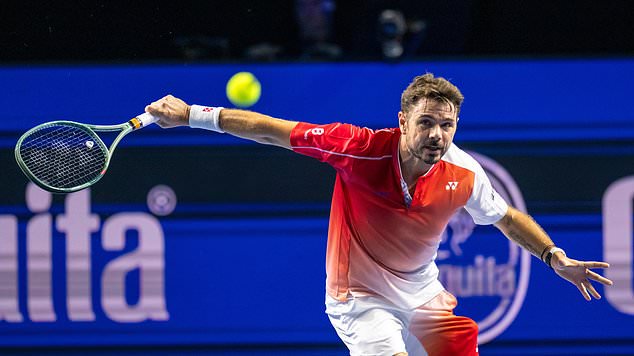 Switzerland's Stan Wawrinka returns a shot to Czech Republic's Jiri Lehecka during the first round of the Swiss Indoors tennis tournament in Basel, Switzerland, Tuesday, Oct. 27, 2026. (Georgios Kefalas/Keystone via AP)