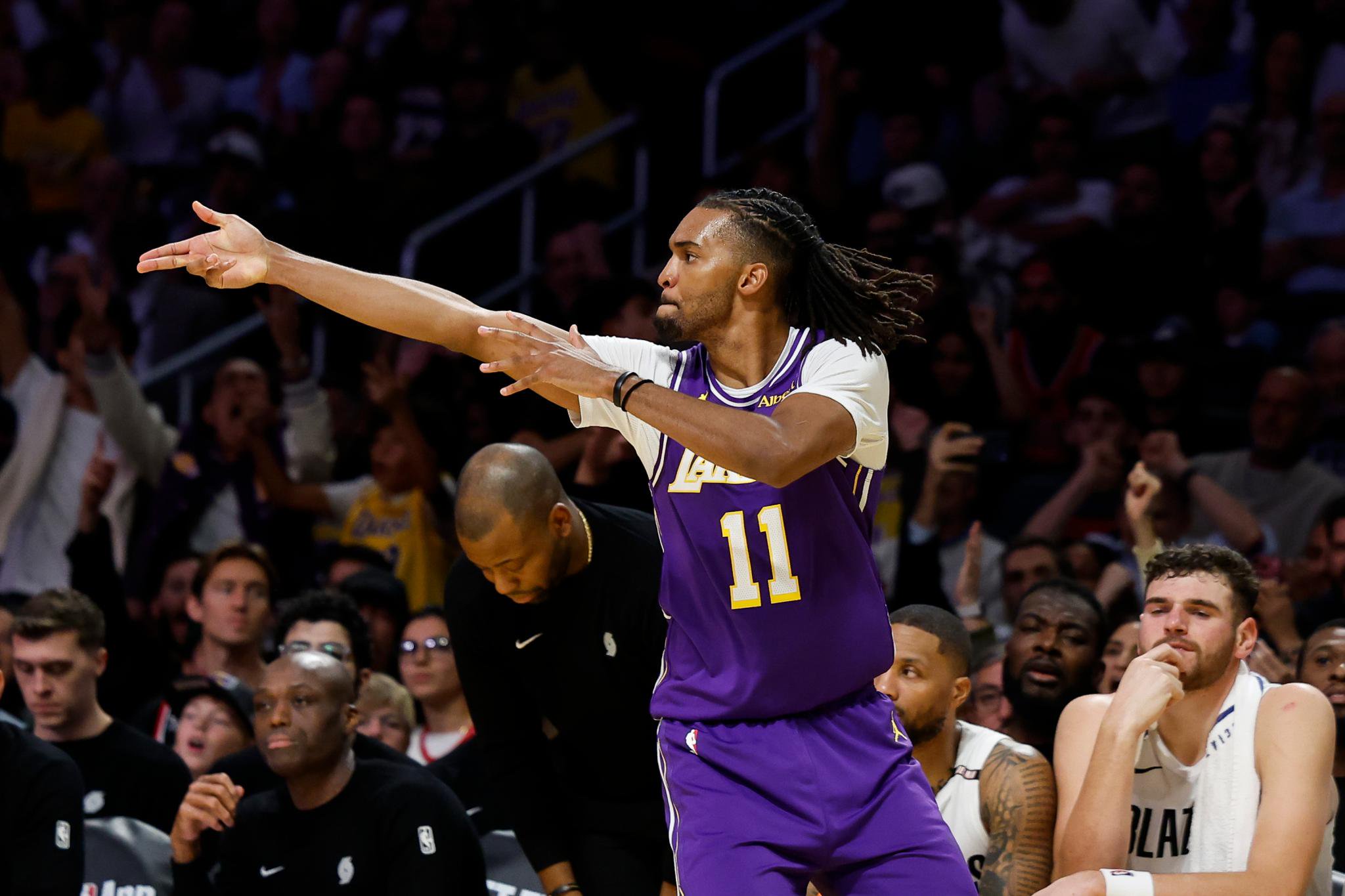 Los Angeles Lakers forward Ziaire Williams reacts after scoring a three-pointer.
