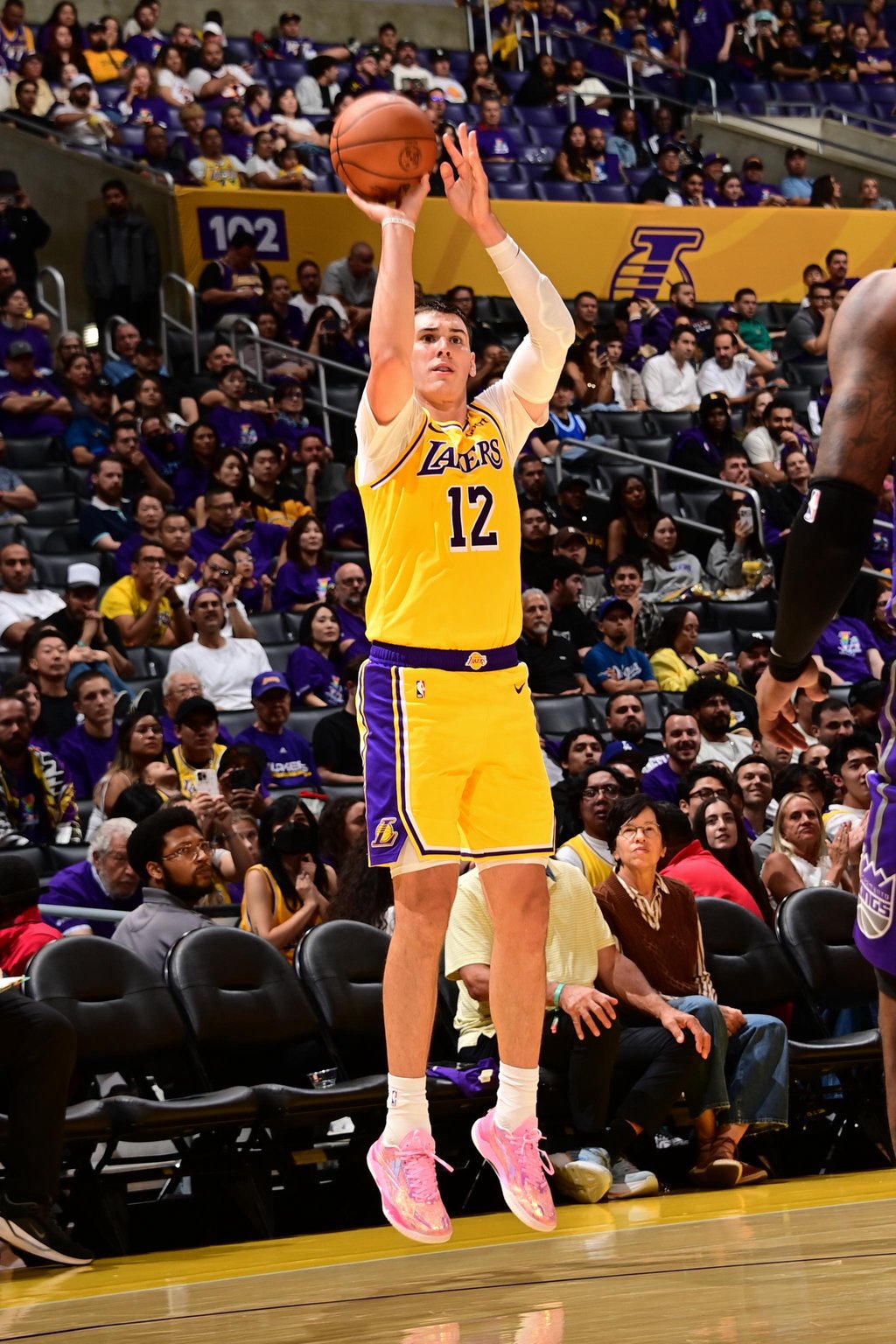 Jake LaRavia #12 of the Los Angeles Lakers shoots the ball during the game against the Sacramento Kings on October 8, 2026 at Crypto.Com Arena in Los Angeles, California.