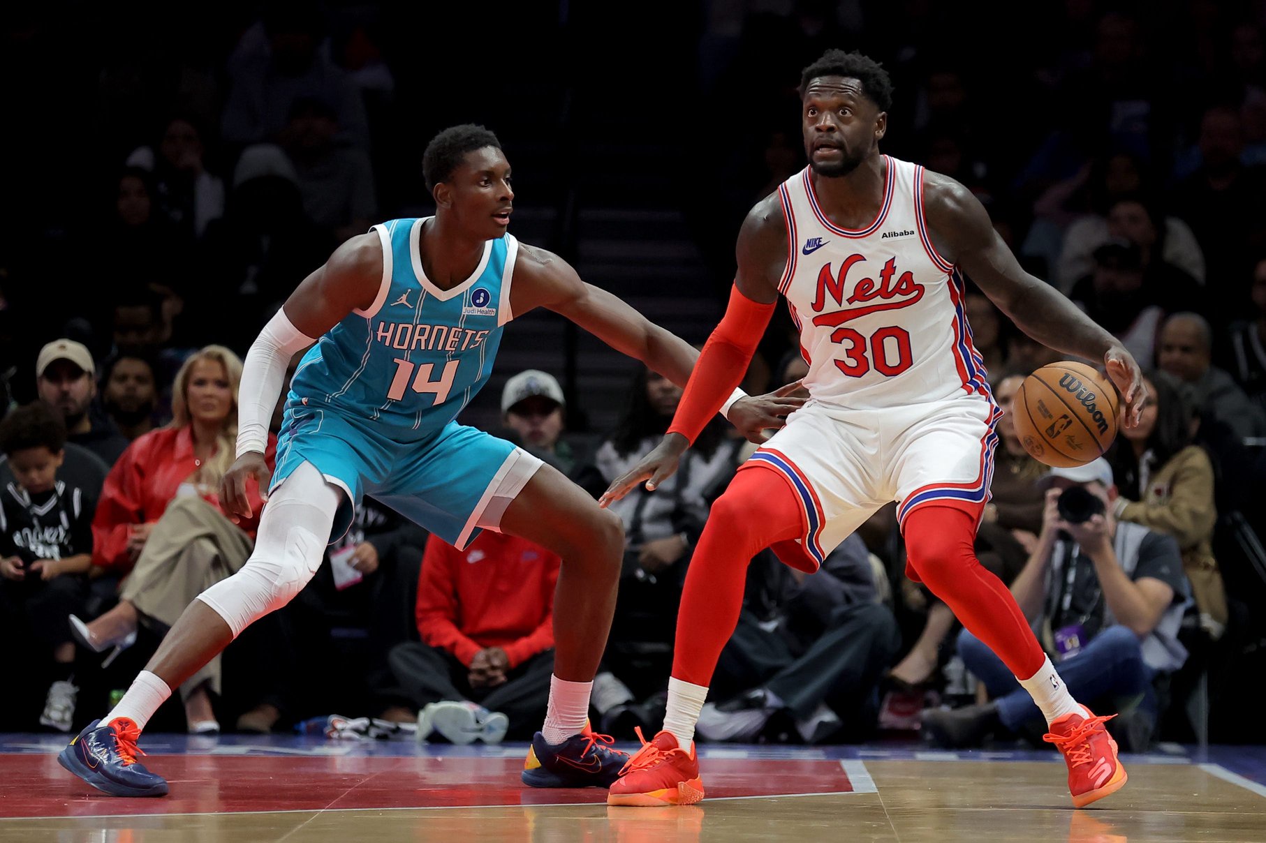 Oct 21, 2026; Brooklyn, New York, USA; Brooklyn Nets forward Julius Randle (30) controls the ball against Charlotte Hornets forward Moussa Diabate (14) during the first quarter at Barclays Center. Mandatory Credit: Brad Penner-Imagn Images