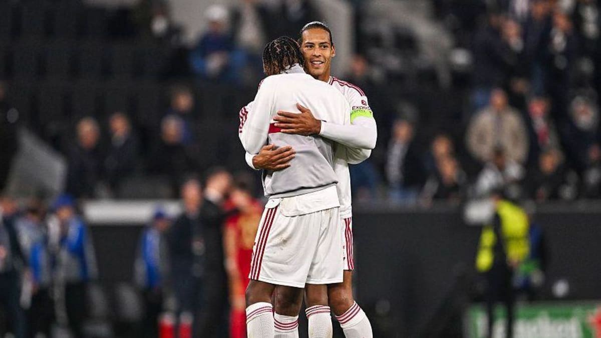 Virgil van Dijk and Bradley Barcola embrace at final whistle