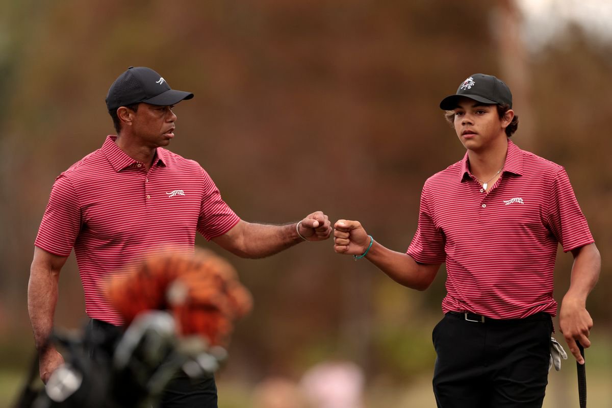 Tiger Woods bumps fists with son, Charlie