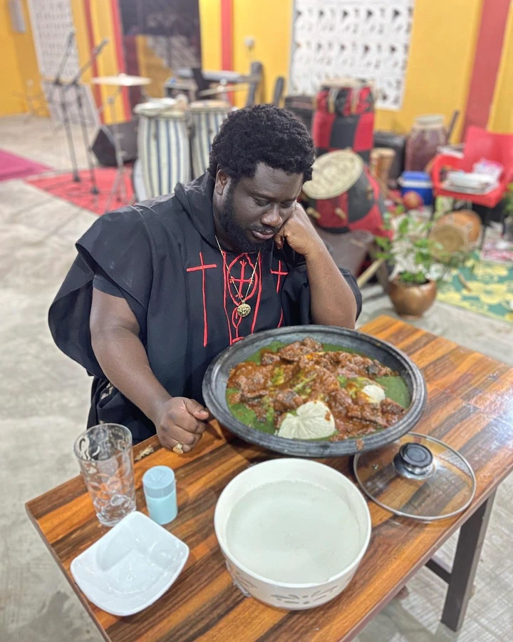 Chop bar pastor, Ajagurajah consumes full bowl of Banku in new photos