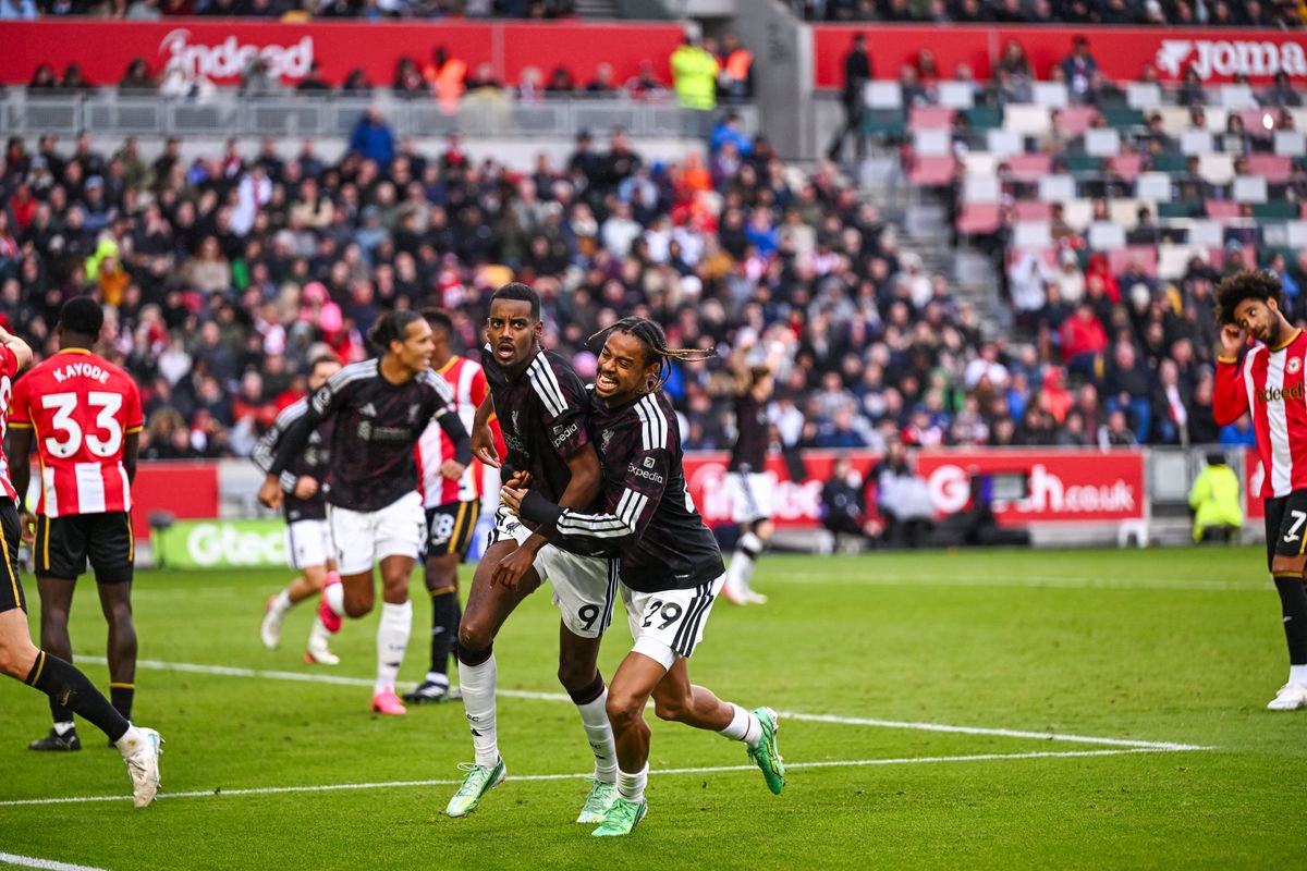 Alexander Isak and Bradley Barcola celebrate Liverpool's winner against Brentford.