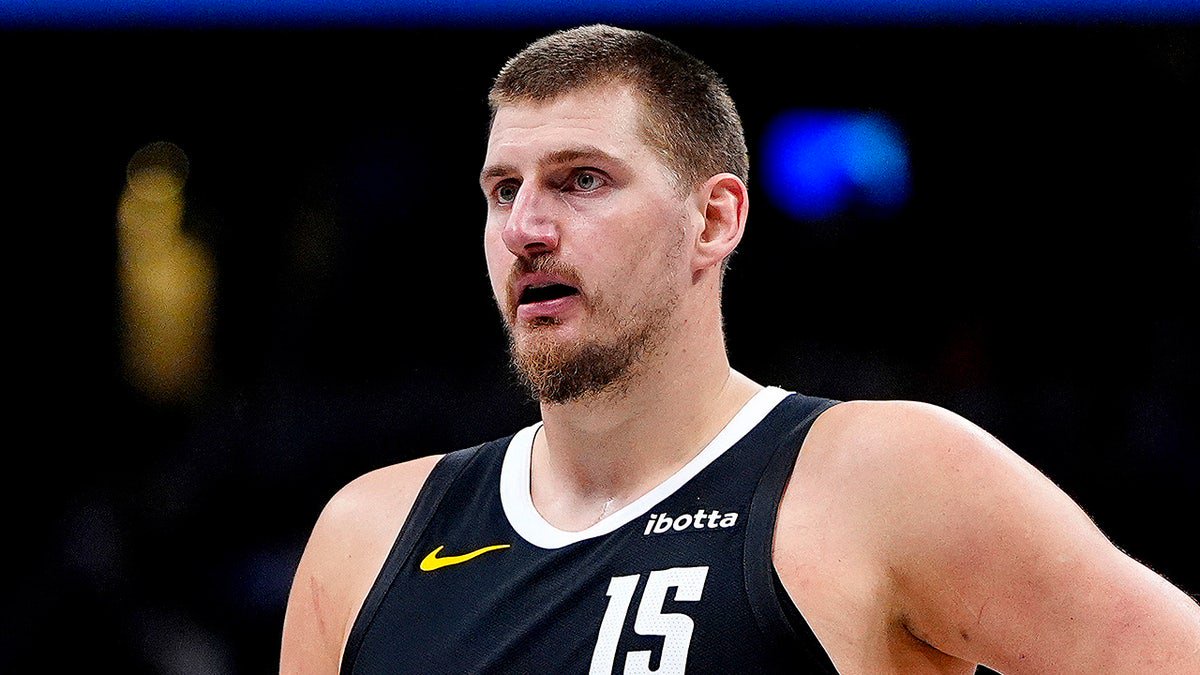 Nikola Jokic looks on