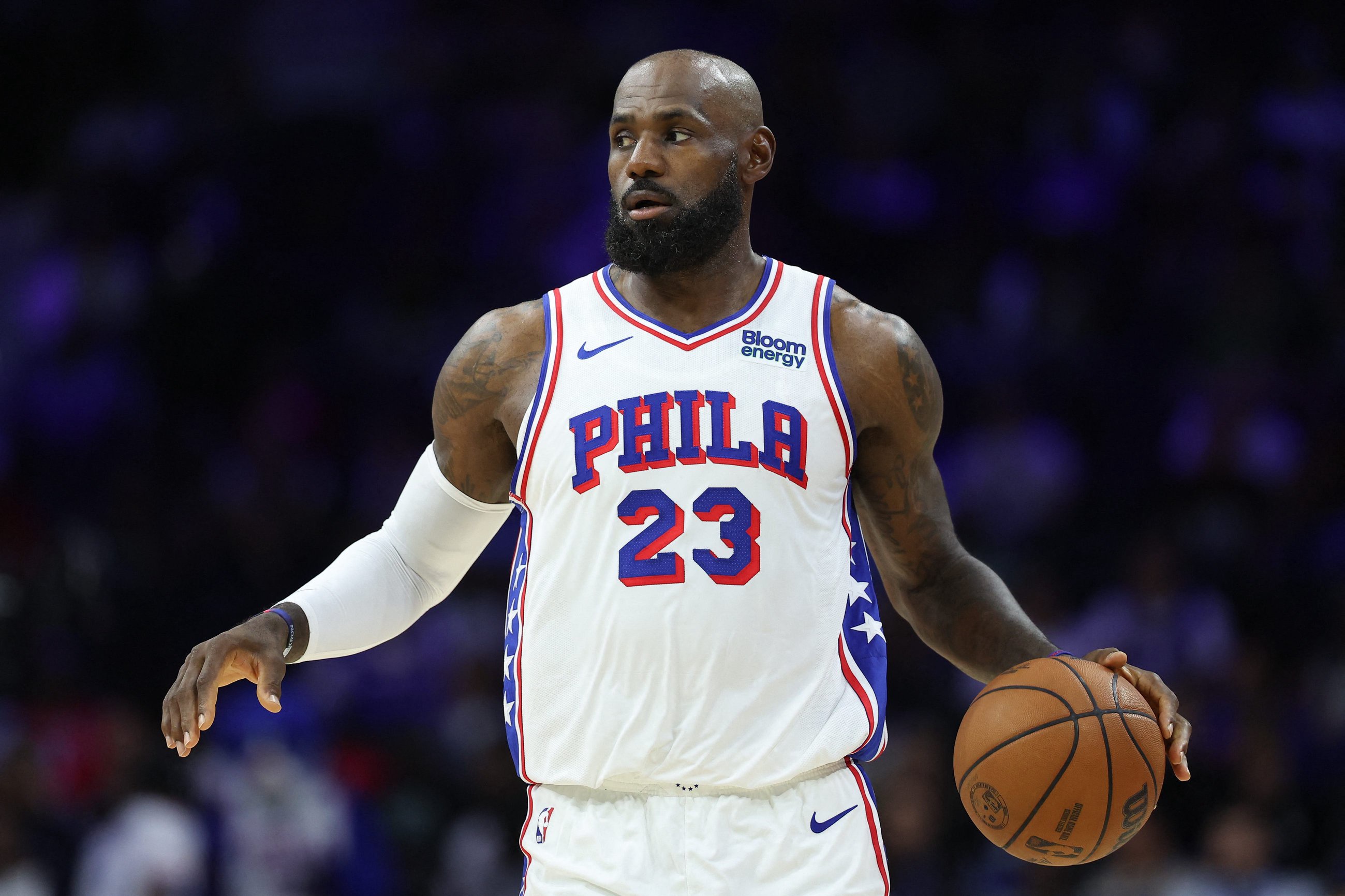 Oct 16, 2026; Philadelphia, Pennsylvania, USA; Philadelphia 76ers forward LeBron James (23) controls the ball against the Boston Celtics during the first quarter at Xfinity Mobile Arena. Mandatory Credit: Bill Streicher-Imagn Images