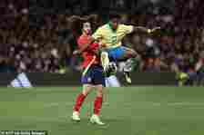 Endrick controls the ball as he is grabbed from behind by Cucurella during the 3-3 draw