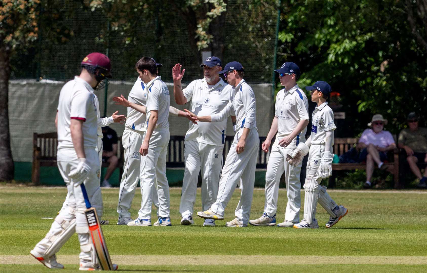 Ollie Smith celebrates wicket