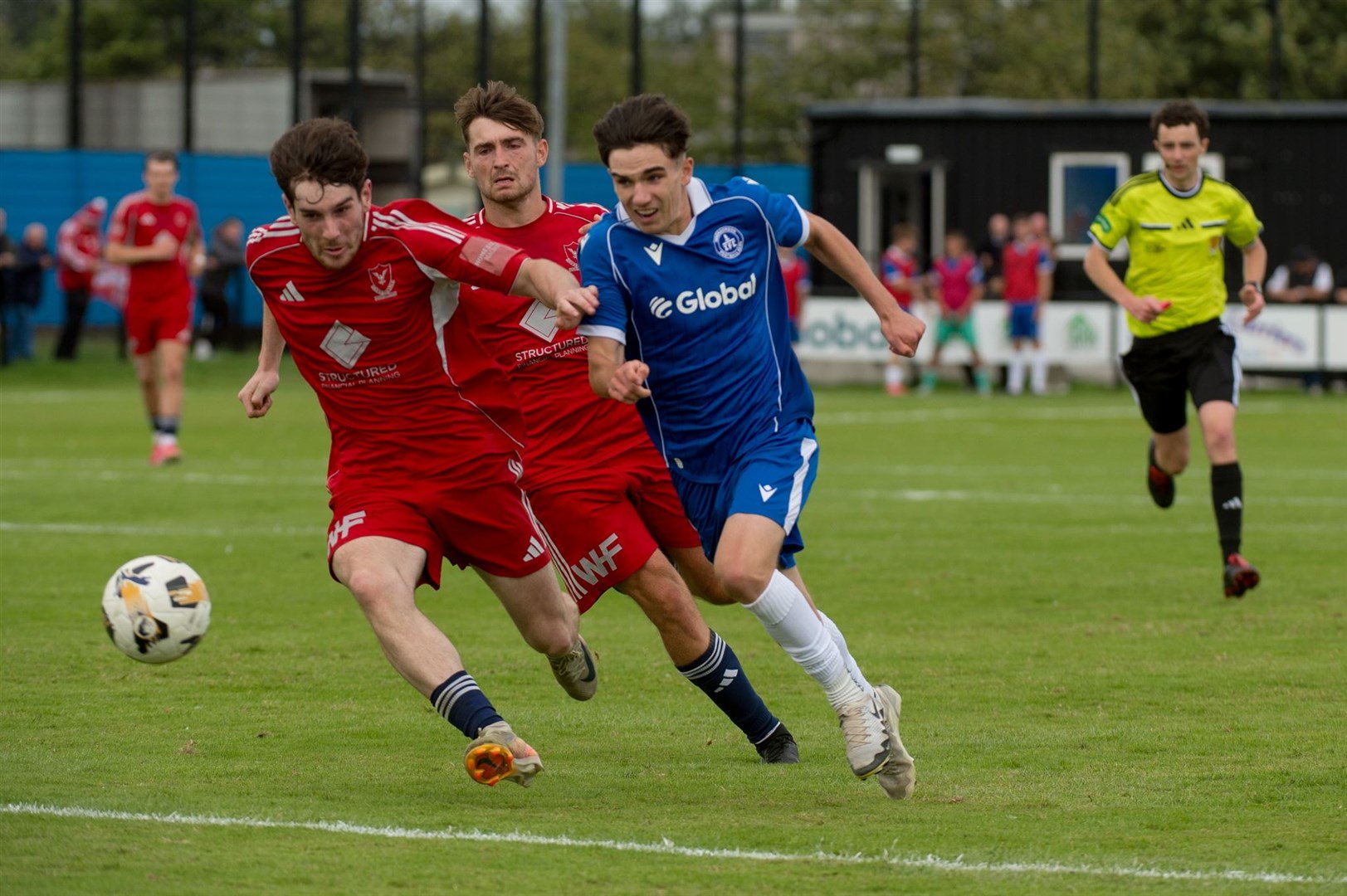 Joe Coyle races for the ball in a 3-0 win for Invergordon against Deveronvale. Picture: Callum Mackay