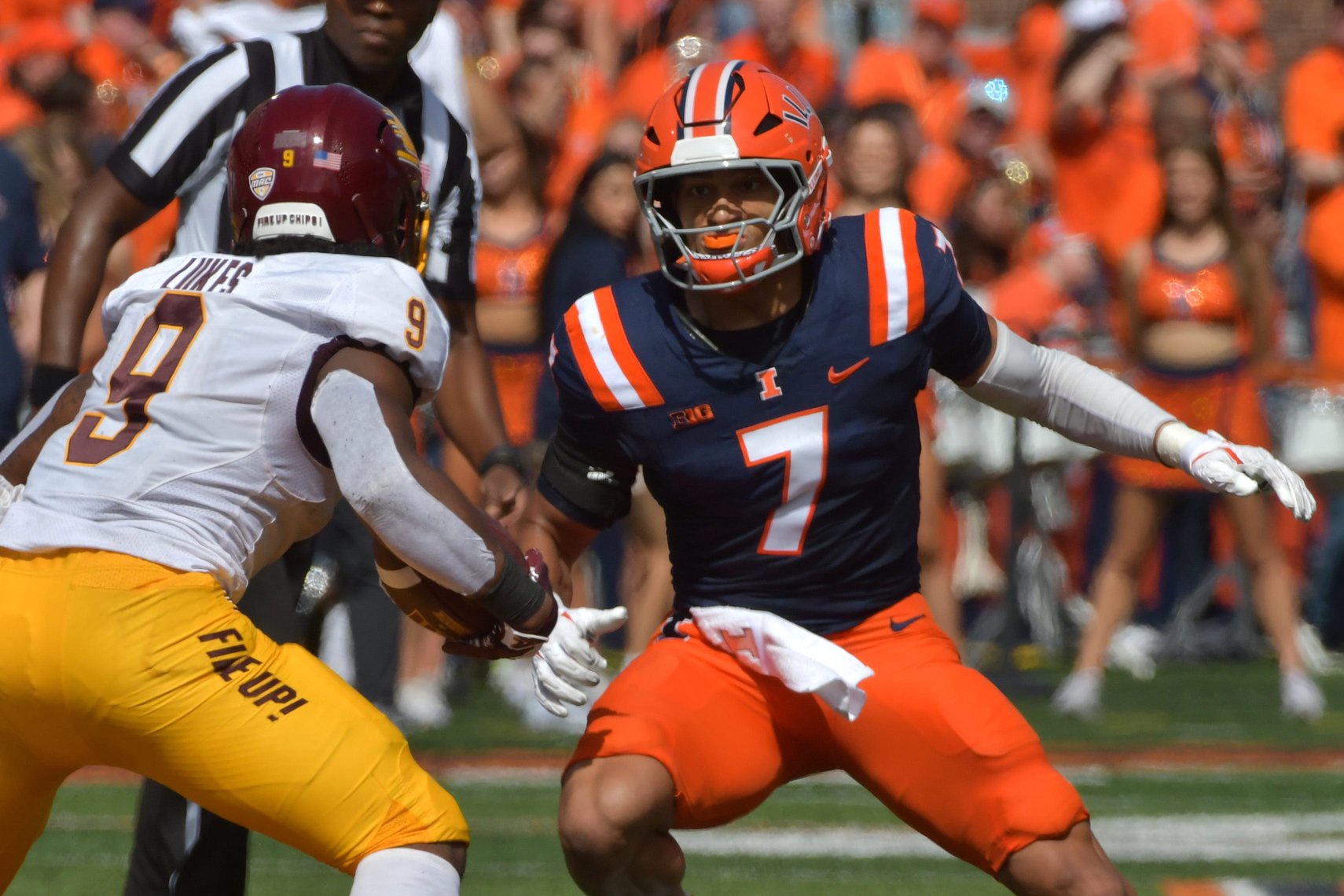 Sep 14, 2024; Champaign, Illinois, USA;  Illinois Fighting Illini defensive back Matthew Bailey (7) pursues Central Michigan Chippewas wide receiver Jordyn Williams (18) during the first half at Memorial Stadium. Mandatory Credit: Ron Johnson-Imagn Images