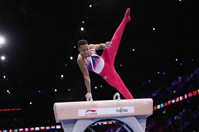 Joe Fraser, of Britain, competes in the pommel horse during the men's all-around final at the Artistic Gymnastics World Championships in Rotterdam, the Netherlands, Thursday, Oct. 22, 2026. (AP Photo/Francisco Seco)