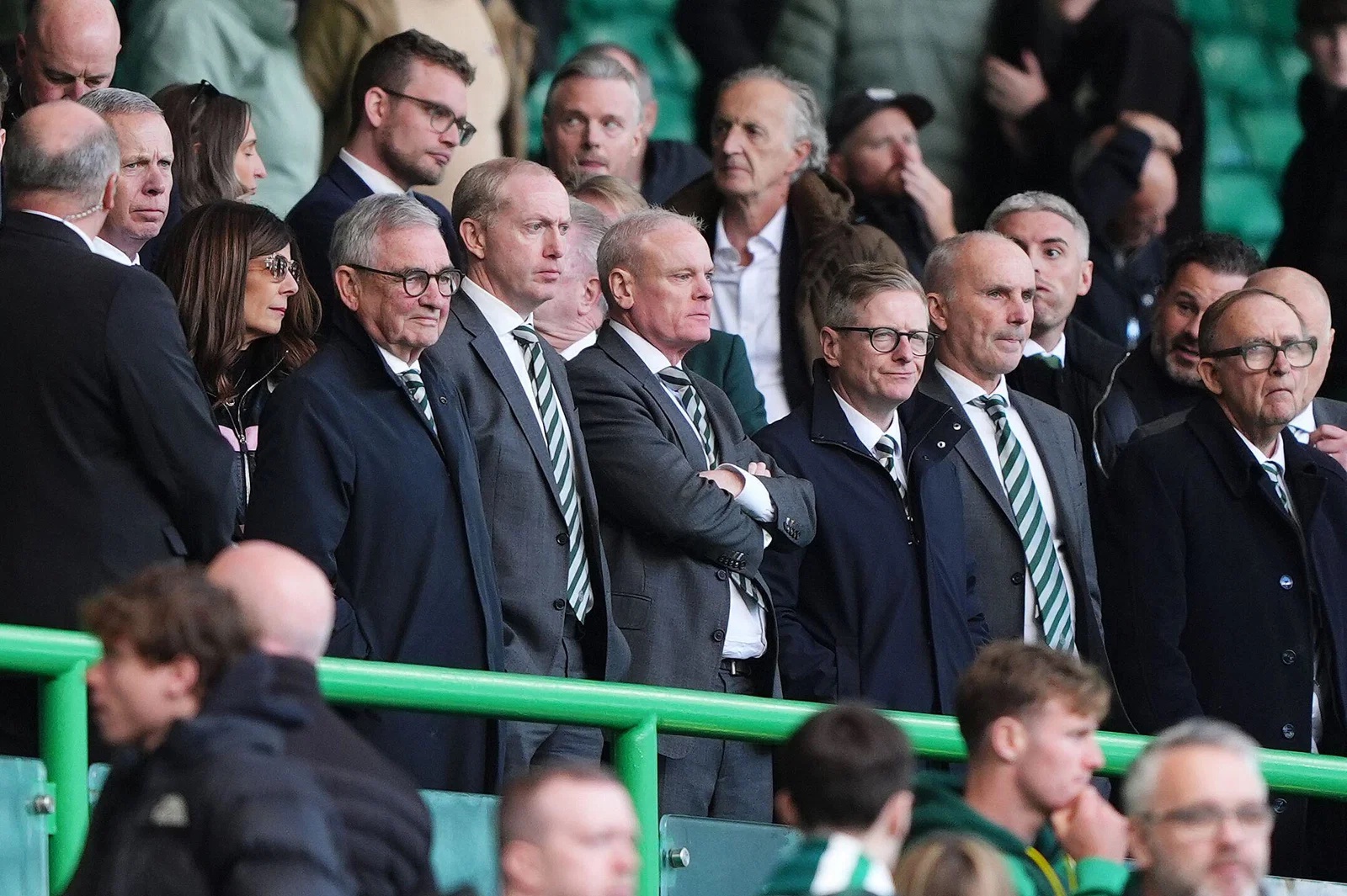Celtic CEO Michael Nicholson, chief financial officer Christopher McKay and board members in the stands at Celtic Park