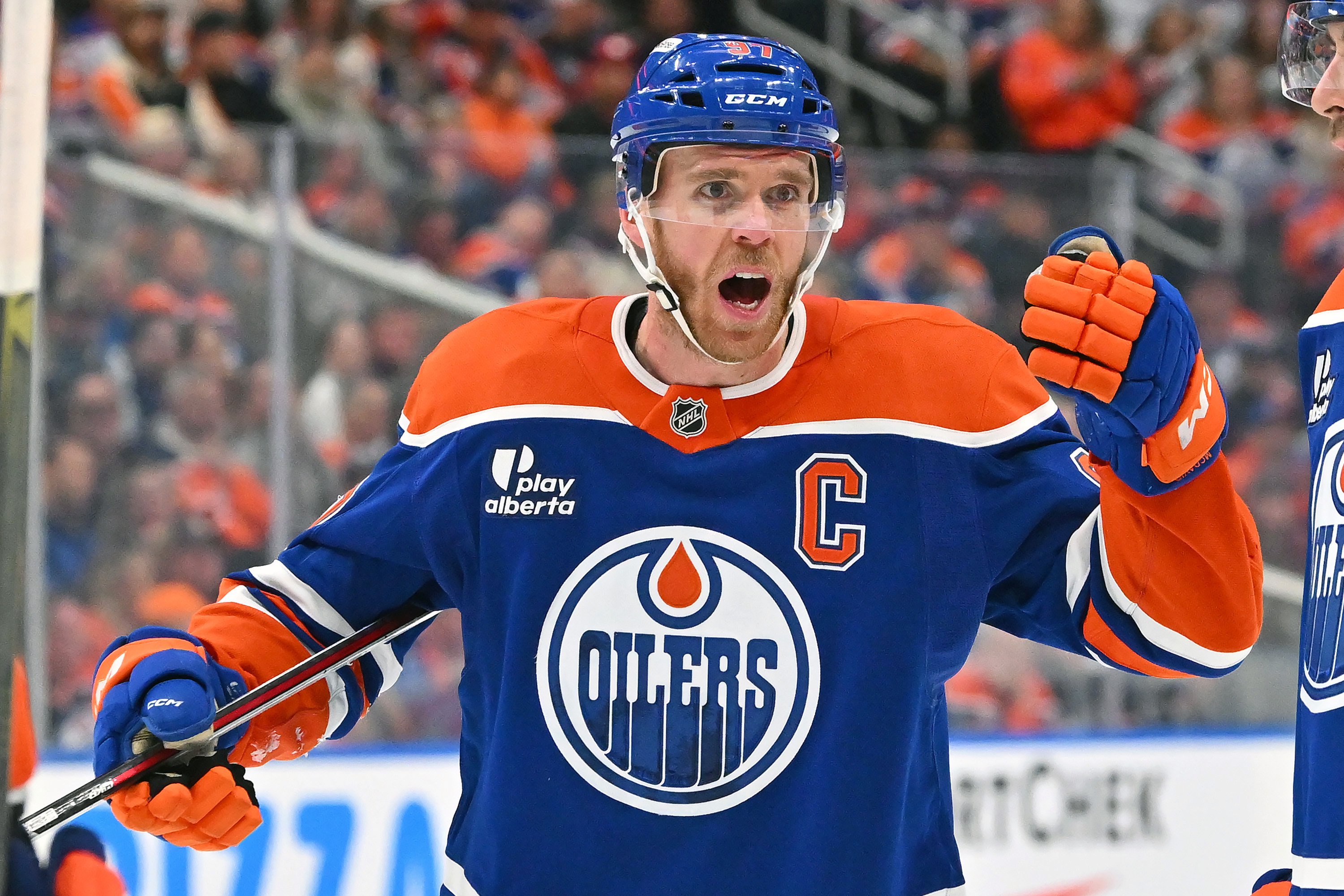 EDMONTON, CANADA - OCTOBER 15: Connor McDavid #97 of the Edmonton Oilers calls in his line mates to discuss the play while awaiting a face-off during the game against the Utah Mammoth at Rogers Place on October 15, 2026, in Edmonton, Alberta, Canada. (Photo by Andy Devlin/NHLI via Getty Images)