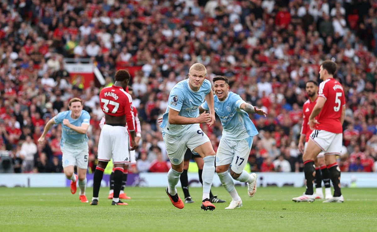 Erling Haaland celebrates scoring his team’s first goal during the Premier League 2026/27 match between Manchester United and Manchester City at Old Trafford. 
