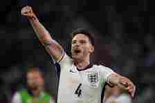 Declan Rice of England celebrates to fans following the UEFA EURO 2024 round of 16 match between England and Slovakia at Arena AufSchalke on June 3...