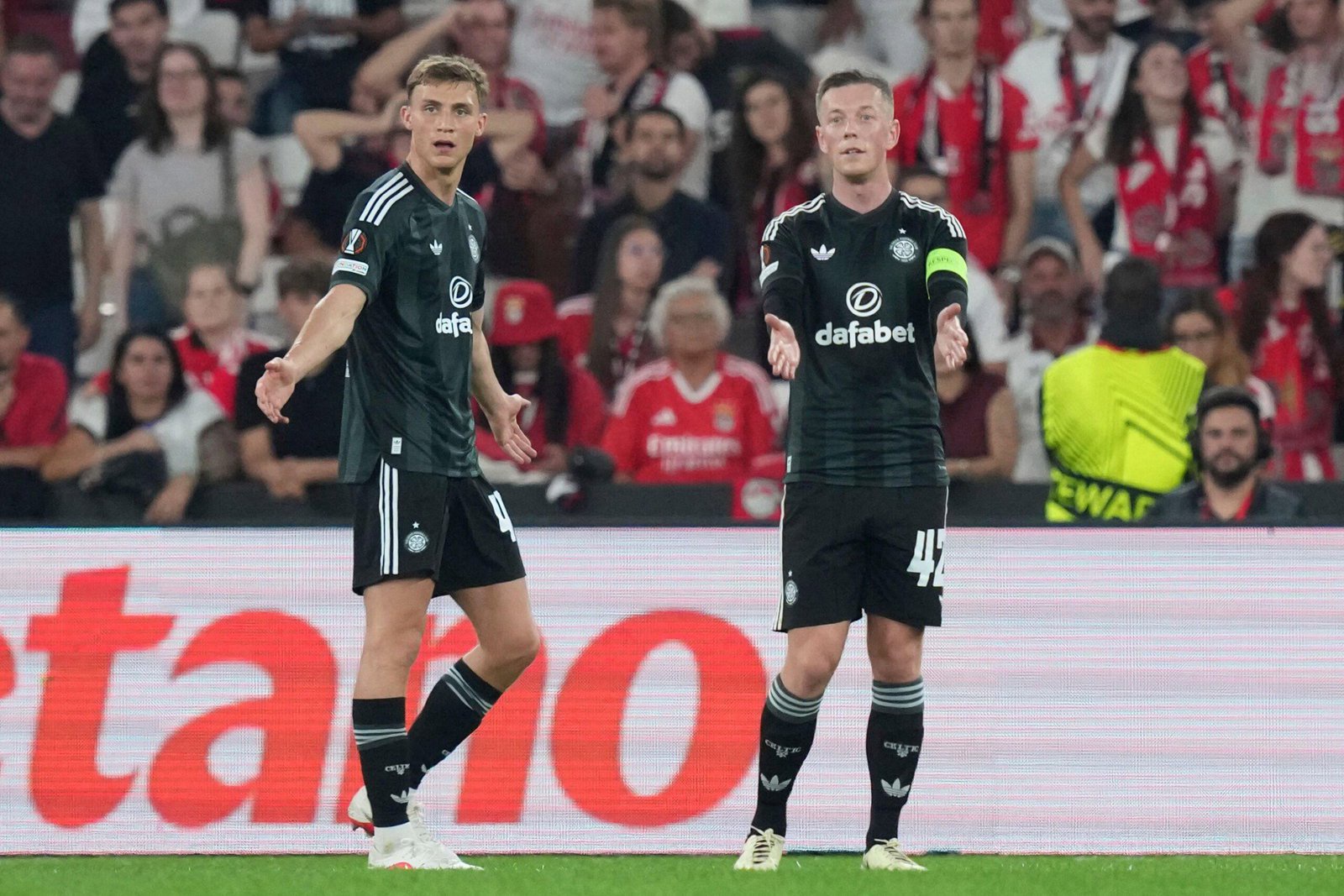 Celtic's Callum McGregor and Dane Murray react during the Europa League match against Benfica in Lisbon