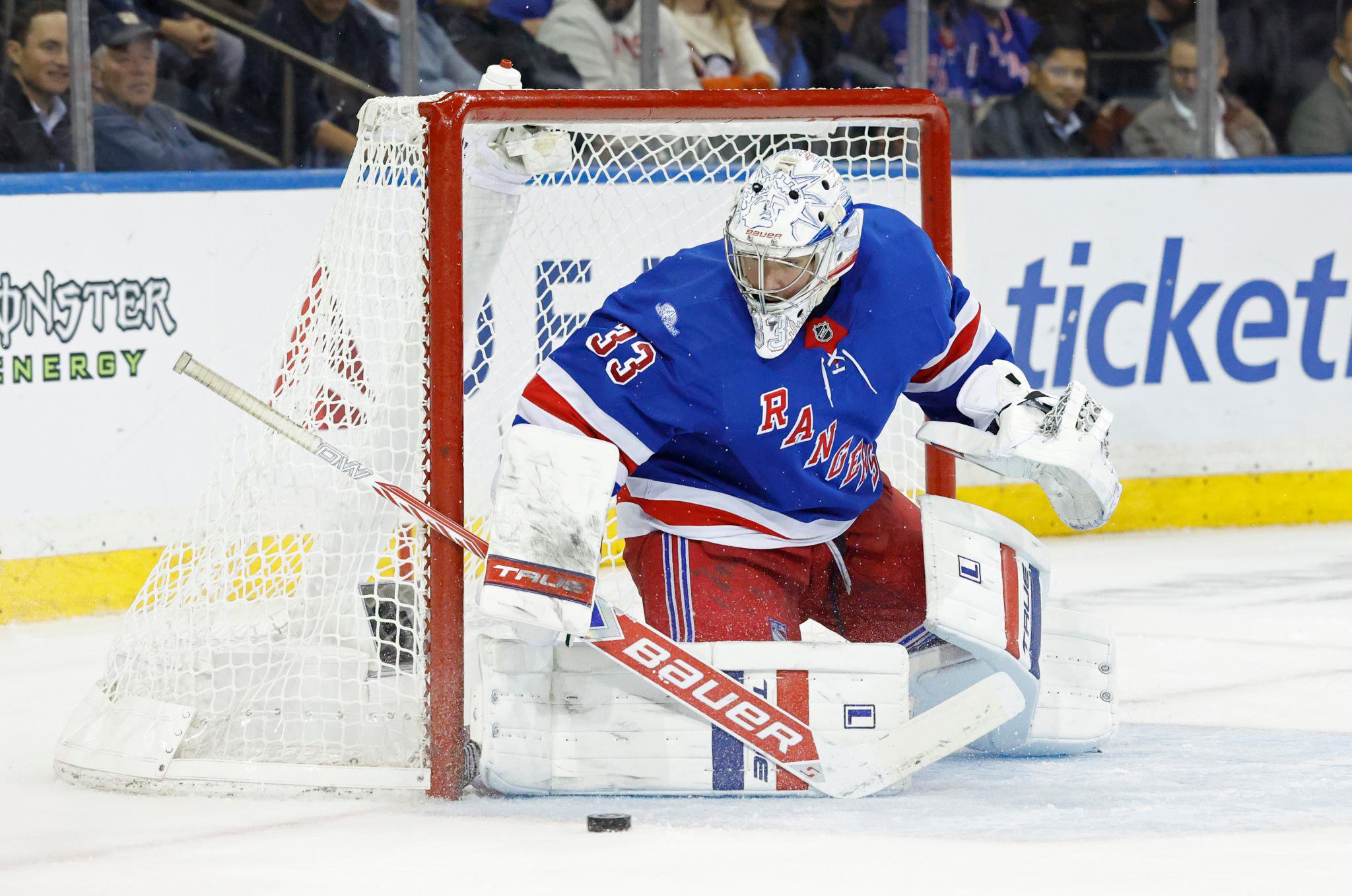 New York Rangers goaltender Dylan Garand (33) makes a save during a game against the Anaheim Ducks.