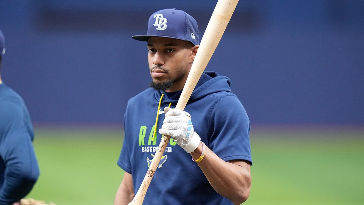 Chandler Simpson, Tampa Bay Rays left fielder, waits for batting practice before Game 3 of the World Series.