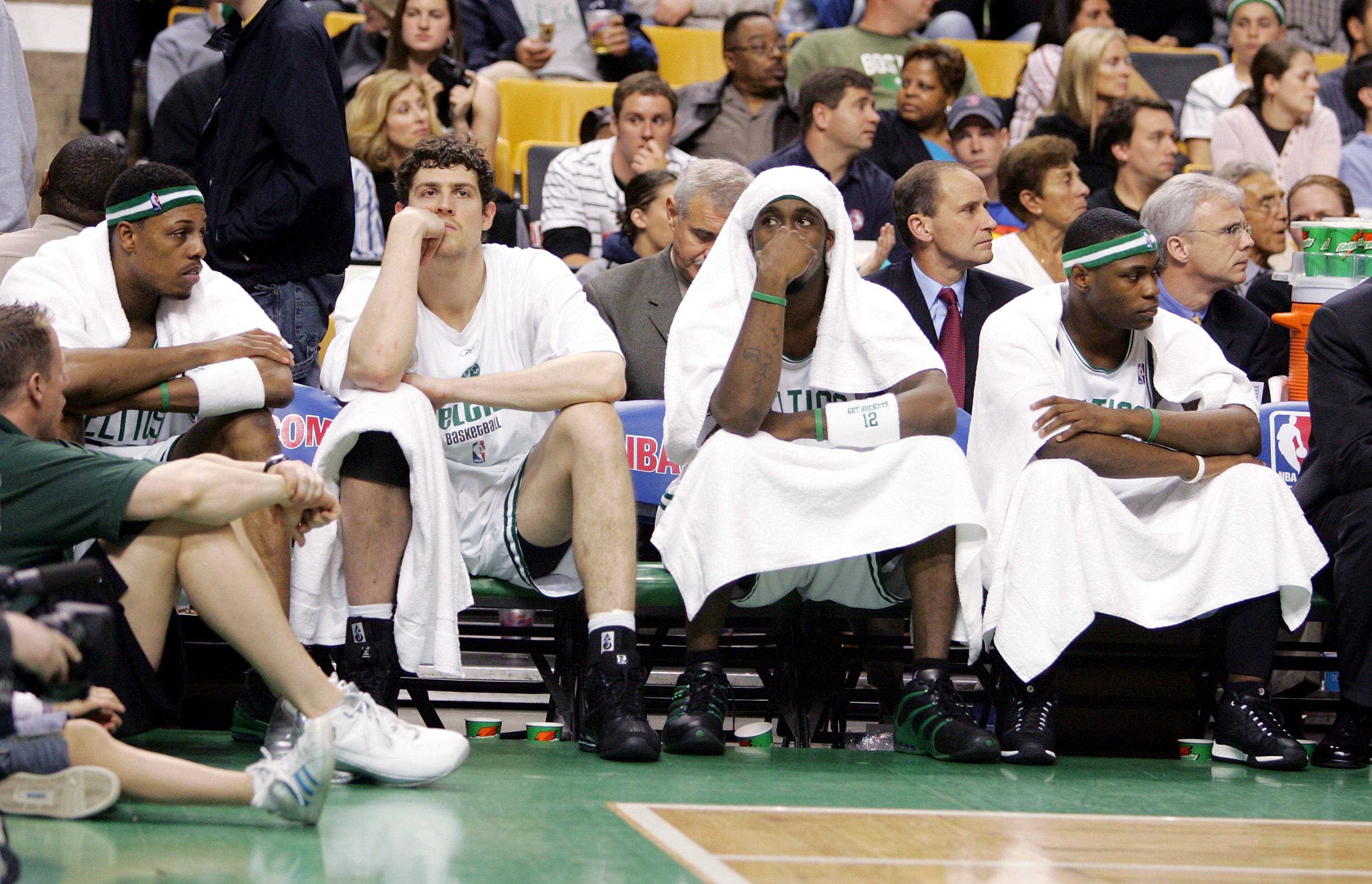 BOSTON - MAY 7: (L-R) Paul Pierce #34, Raef LaFrentz #45, Ricky Davis #12, and Marcus Banks #11 of the Boston Celtics watch the end of their game against the Indiana Pacers in Game seven of the Eastern Conference Quarterfinals during the 2005 NBA Playoffs at Fleet Center on May 7, 2005 in Boston, Massachusetts. The Pacers defeated the Celtics 97-70 to win the series four games to three. NOTE TO USER: User expressly acknowledges and agrees that, by downloading and or using this photograph, User is consenting to the terms and conditions of the Getty Images License Agreement. (Photo by Jim McIsaac/Getty Images)