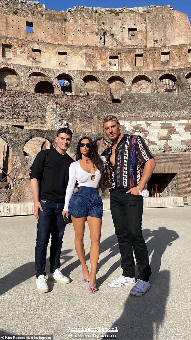 Chic in the city: Kim, meanwhile,  looked chic as can be while touring the Colosseum in Rome with her glam squad in snaps shared to Instagram on Monday morning
