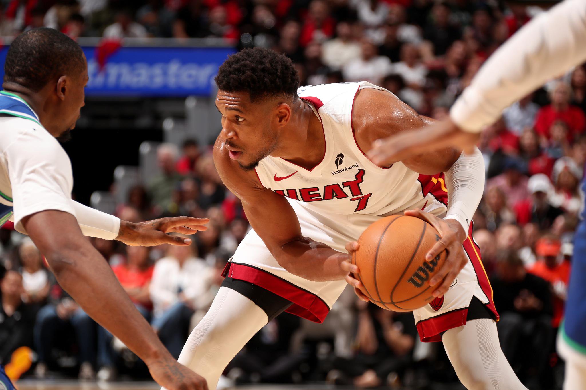 Giannis Antetokounmpo of the Miami Heat looks to pass the ball during a game against the Minnesota Timberwolves.