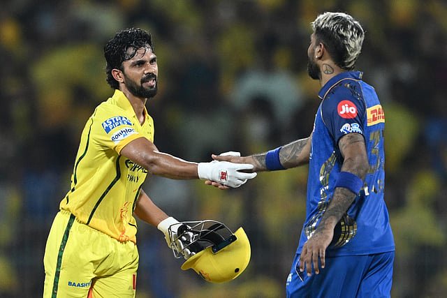 Mumbai Indians' captain Indian cricket player Hardik Pandya (R) congratulates Chennai Super Kings' captain Indian cricket player Ruturaj Gaikwad after winning the 2026 Indian Premier League (IPL) T20 match between Chennai Super Kings and Mumbai Indians at the MA Chidambaram Stadium in Chennai on May 2, 2026.