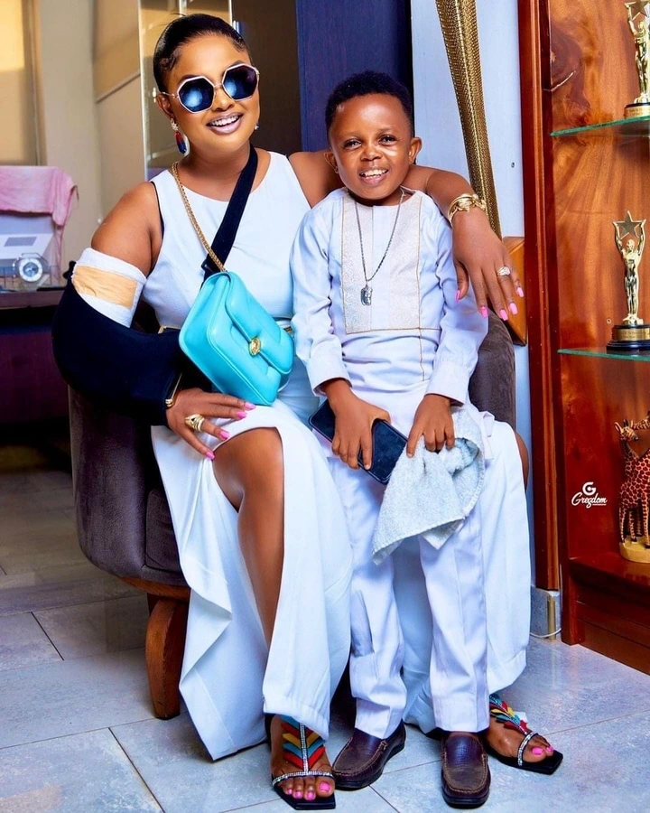 New Photos of Nana Ama Mcbrown Carrying Don Little Causes Stir On The Internet