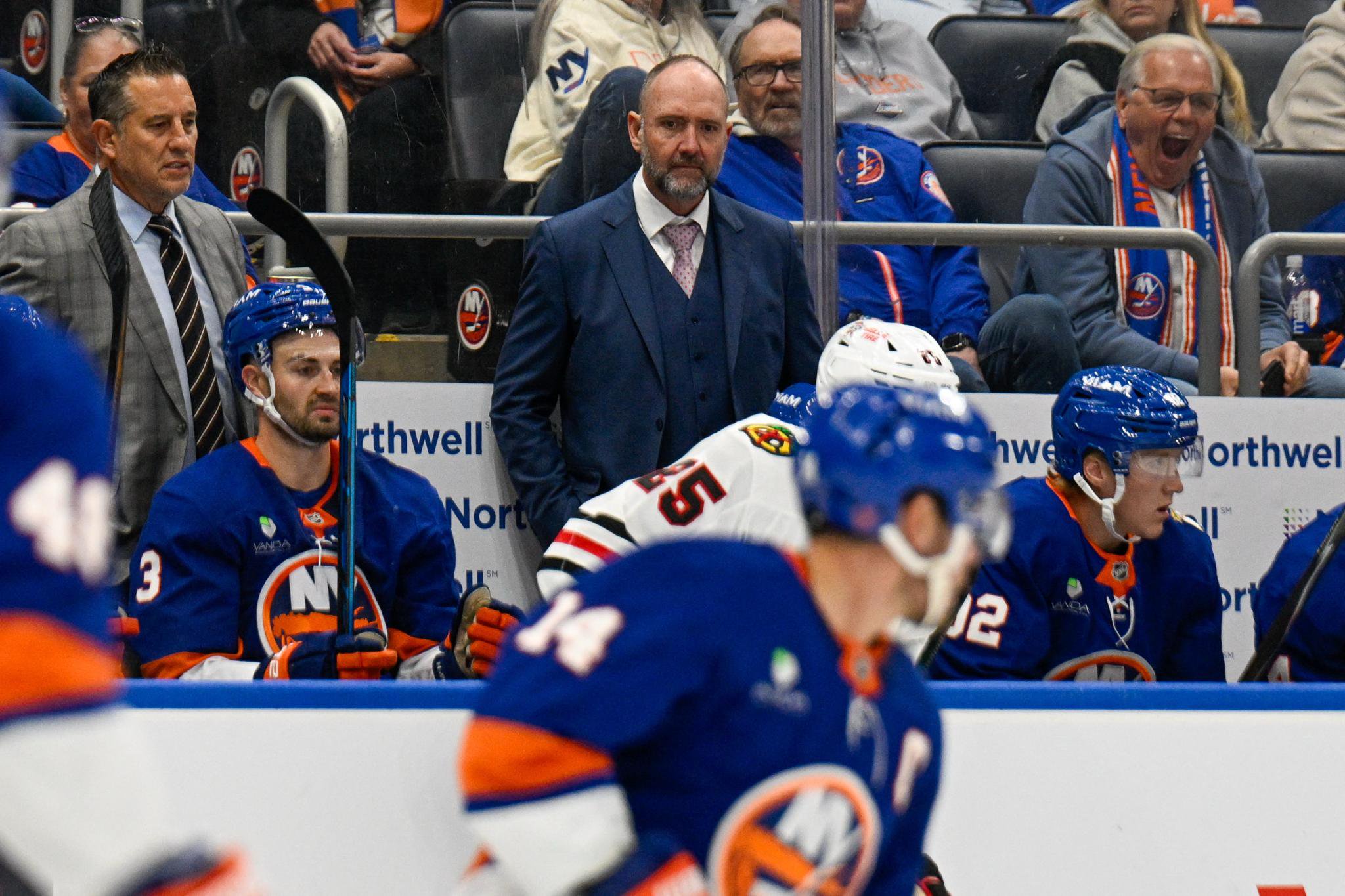 New York Islanders head coach Pete DeBoer watches play against the Chicago Blackhawks from the bench.