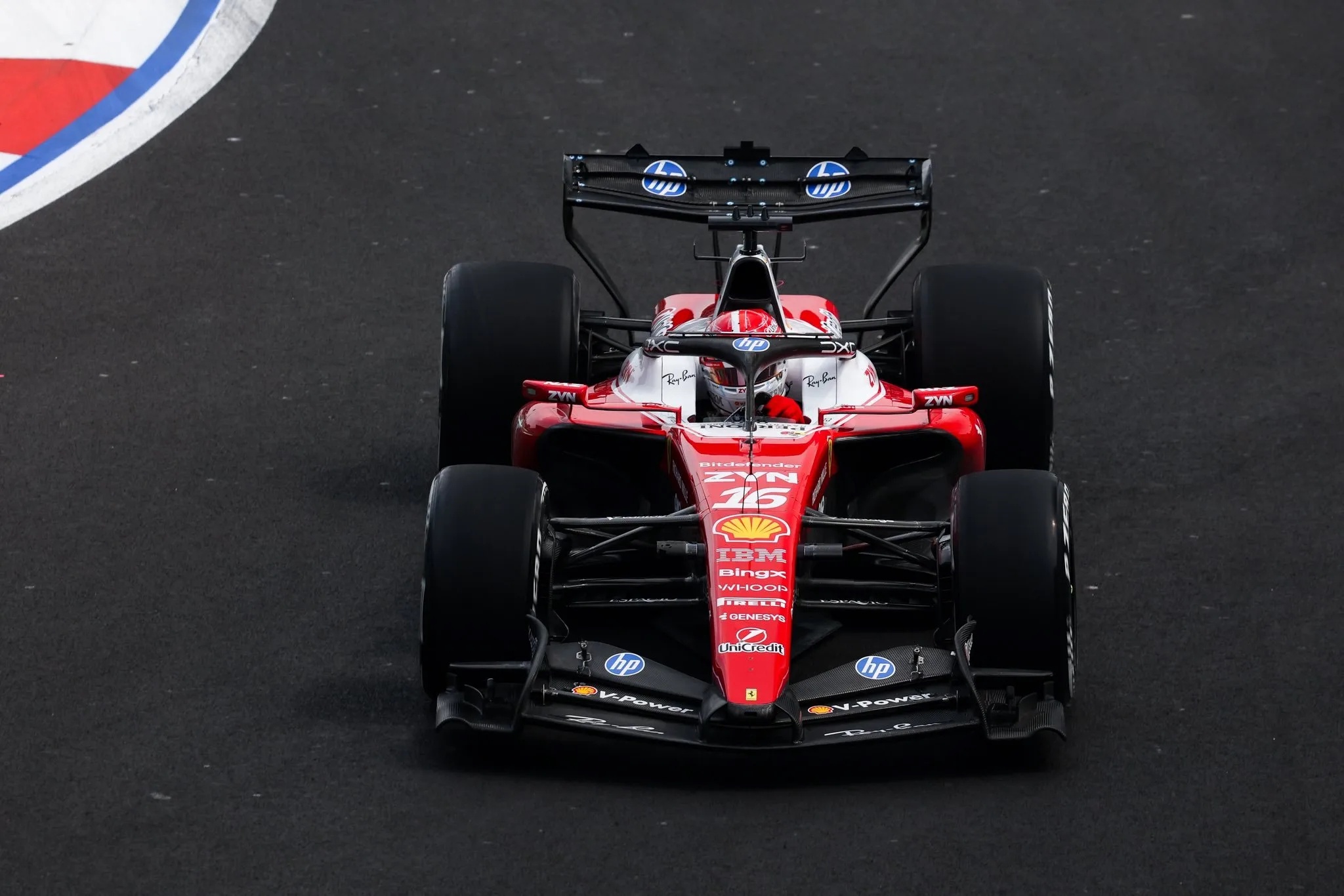 Ferrari F1 car number 16 on track, with Shell, IBM and HP logos, racing in Mexico City practice