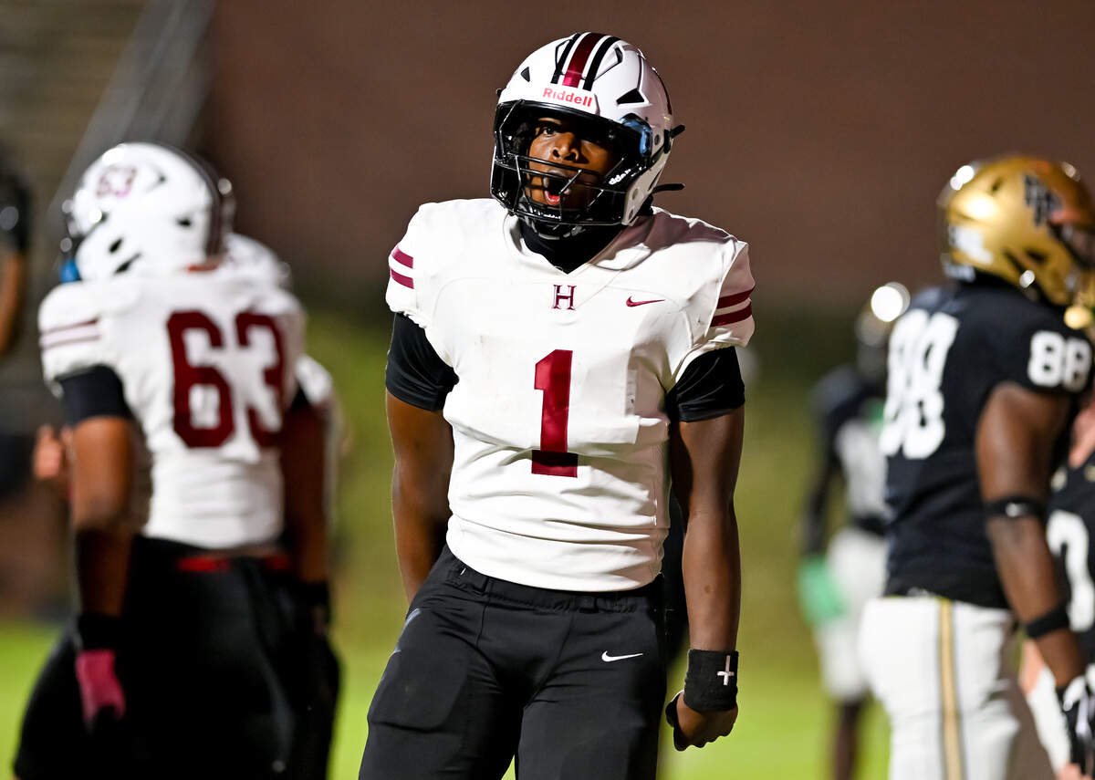 Howard quarterback Zavion Deshazier (1) celebrates a first quarter touchdown during the Huskies’ 28-21 overtime loss to Mary Persons Friday night.