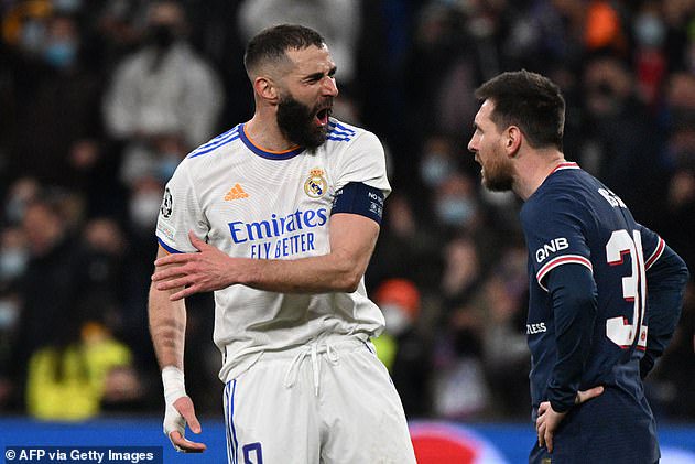 Karim Benzema celebrates on his way to a hat-trick as Lionel Messi looks on dejected
