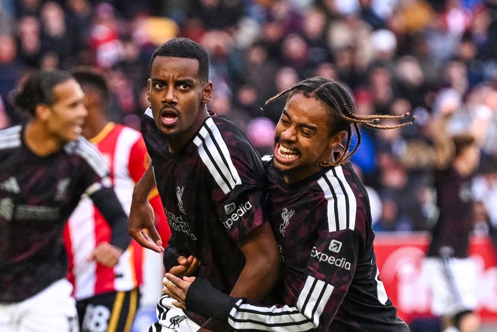 Alexander Isak and Bradley Barcola celebrate Liverpool's winner against Brentford.