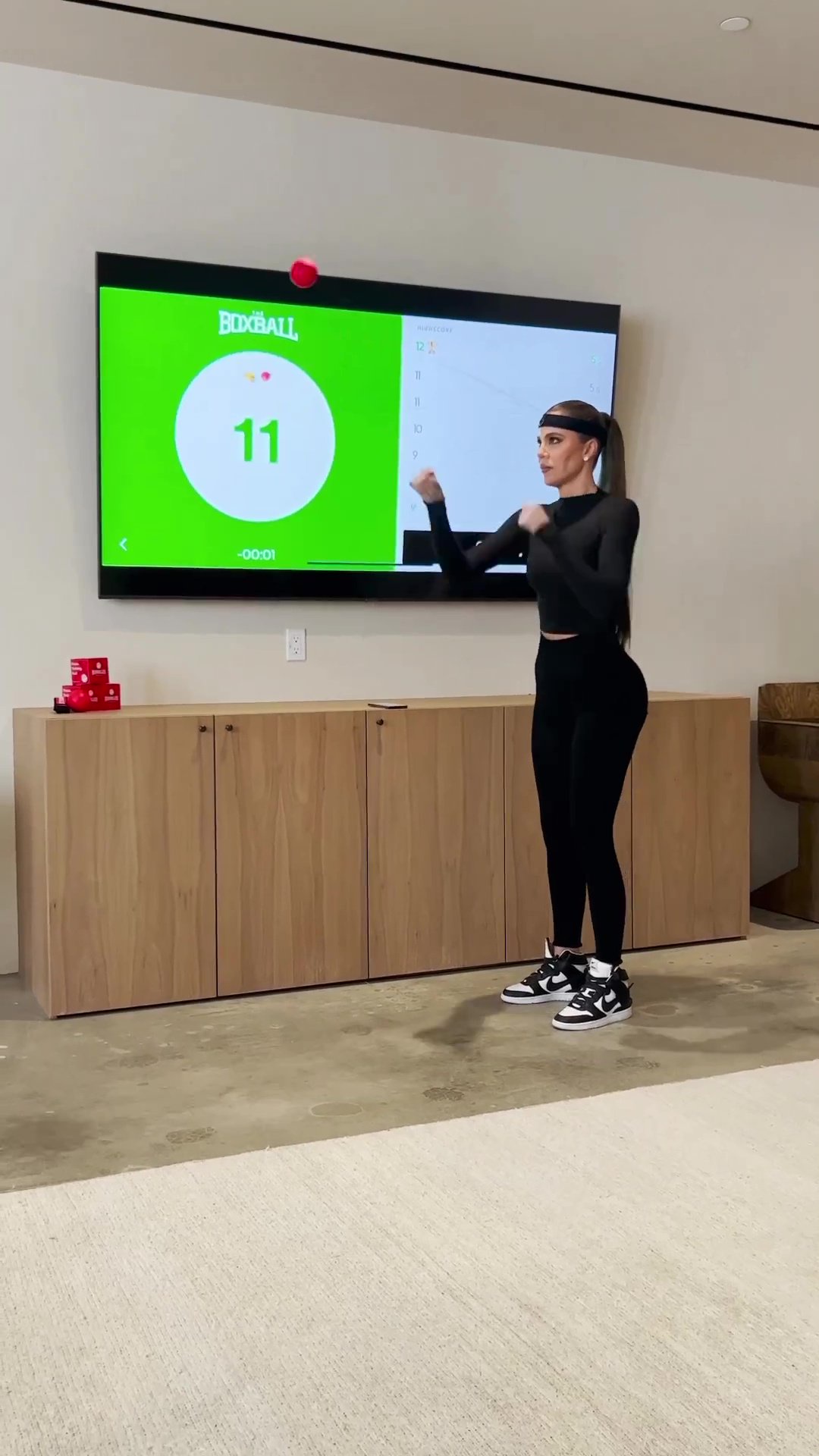 Khloe Kardashian rocked skintight leggings with matching sneakers with her BFF Malika as she shows off her ‘boxing’ skills (Photos)