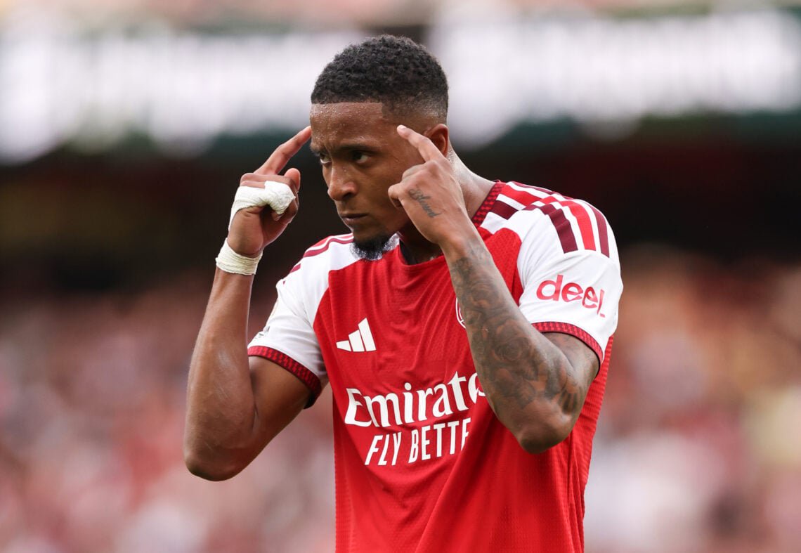 Ezri Konsa with a focused expression playing for Arsenal against Chelsea