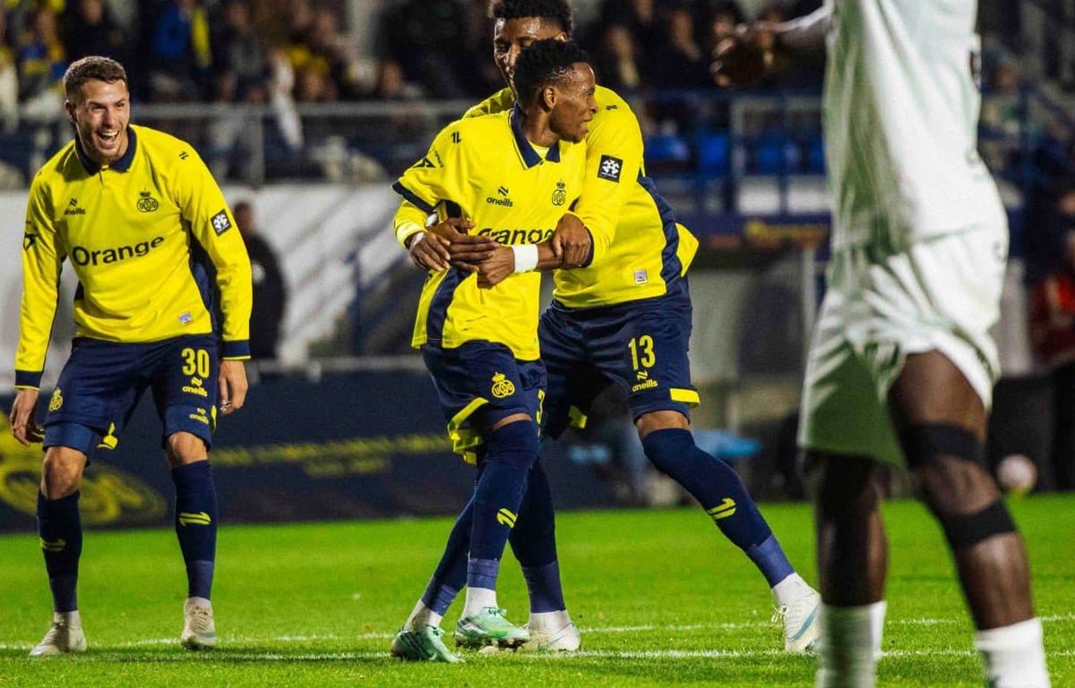 Relebohile Mofokeng celebrating with his teammates