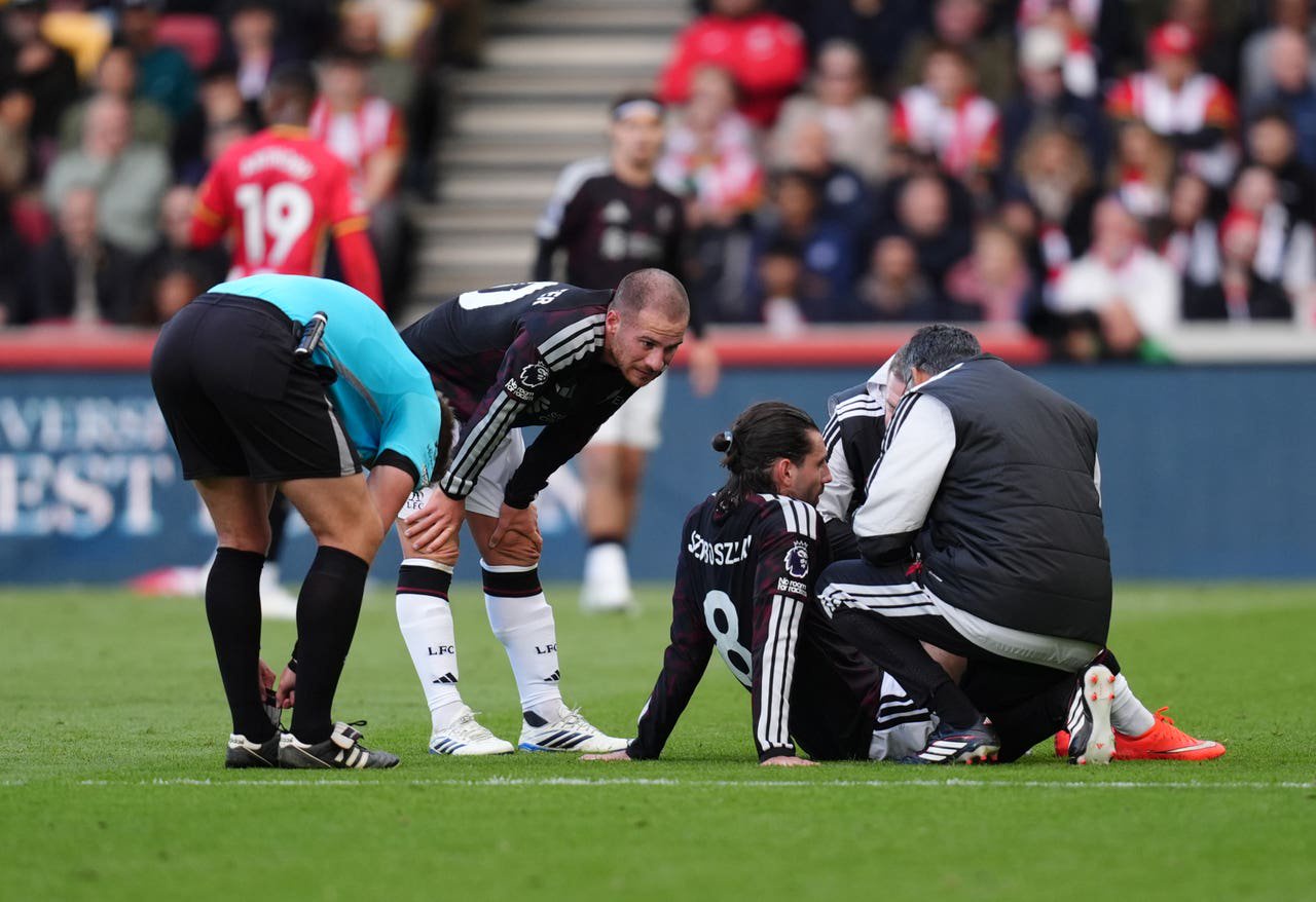 Liverpool’s Dominik Szoboszlai is treated on the pitch