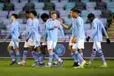 Josh Adam of Manchester City celebrates with team mates after scoring their sides second goal during the UEFA Youth League 2023/24 match between Ma...