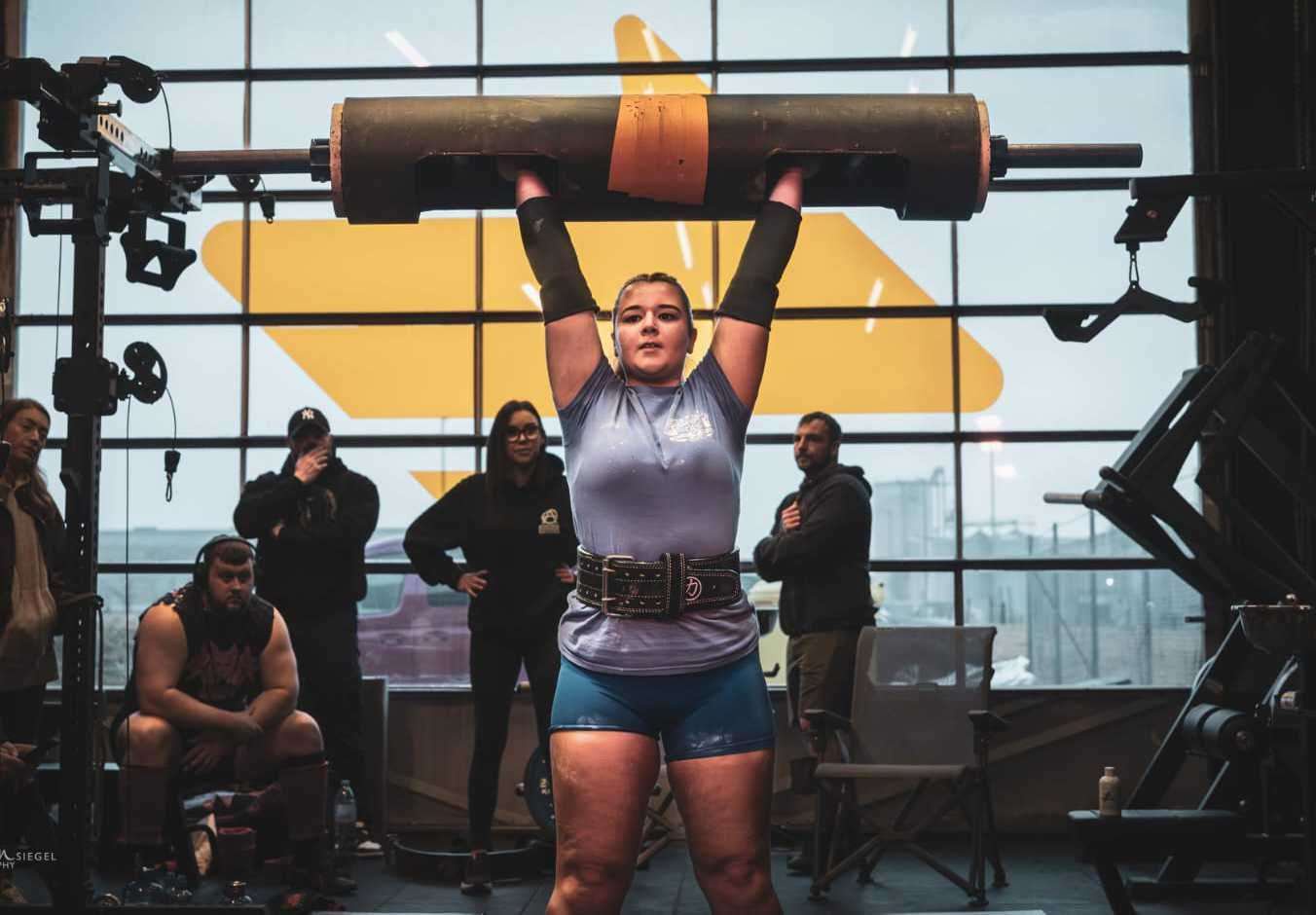Lauri Siegel during a log press.
