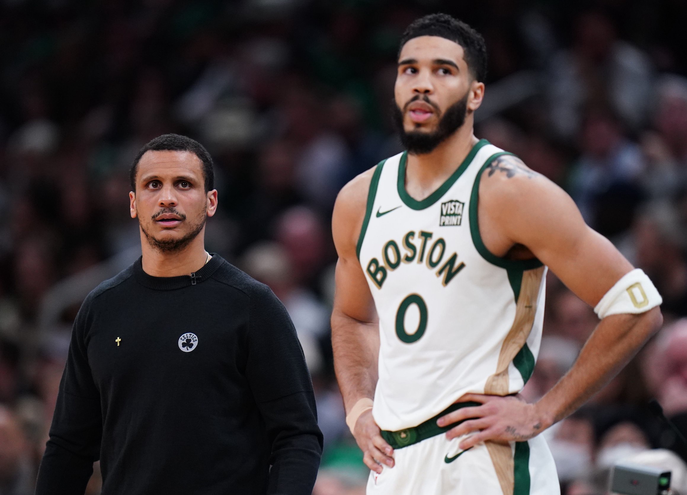 Jan 19, 2024; Boston, Massachusetts, USA; Boston Celtics head coach Joe Mazzulla with forward Jayson Tatum (0) look on from the sideline as they take on the Denver Nuggets at TD Garden. Mandatory Credit: David Butler II-USA TODAY Sports