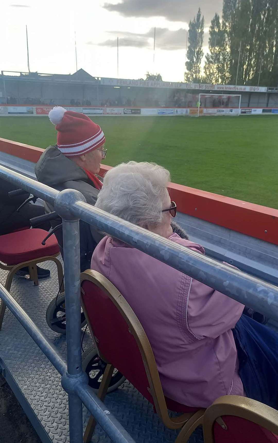 John and his wife Sheila watching the game