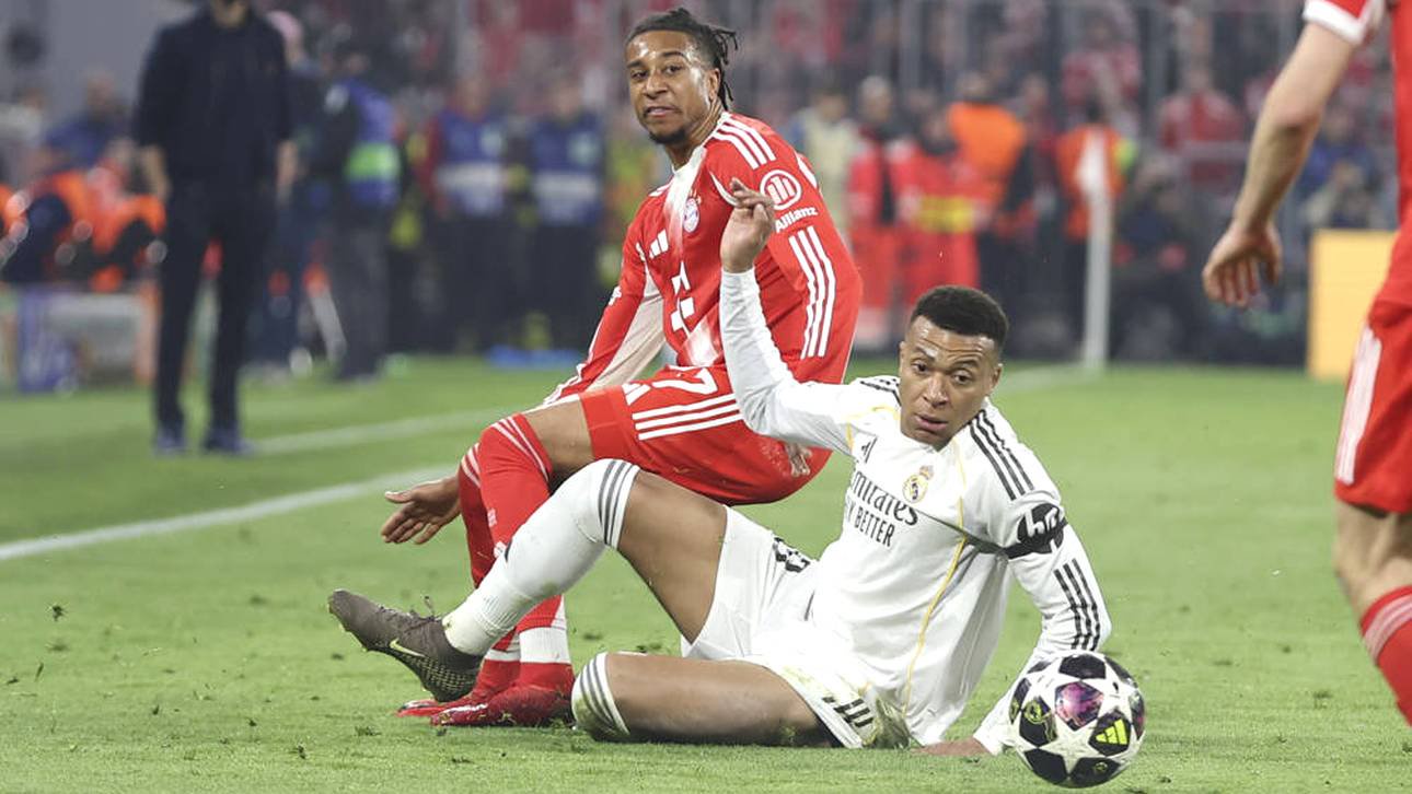 Michael Olise und Kylian Mbappé im Zweikampf