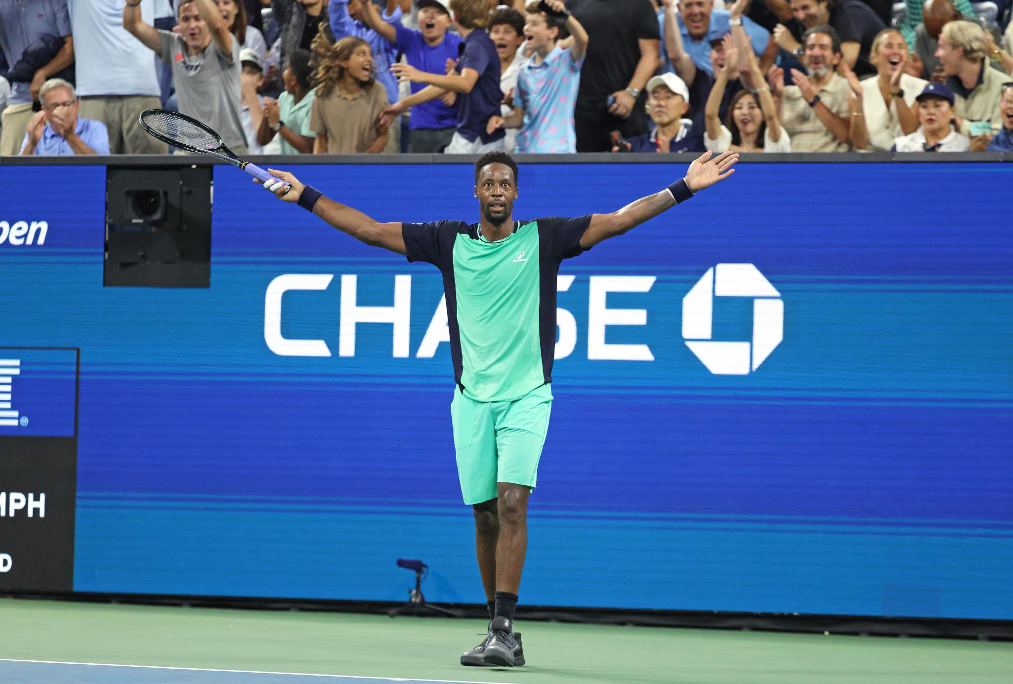 Gael Monfils reacts after defeating Adolfo Daniel Vallejo in a first-round match at the US Open.