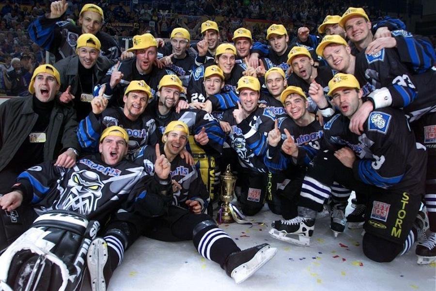 Manchester Storm celebrate winning the 1999 Cup wearing winner caps