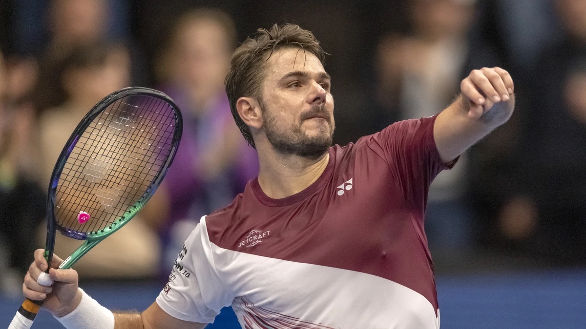 Switzerland's Stan Wawrinka cheers after winning his first round match against Norway's Casper Ruud at the Swiss Indoors tennis tournament at the St. Jakobshalle in Basel, Switzerland, on Tu ...