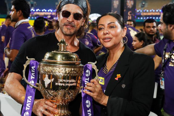 wners of theKolkata Knight Riders, Shah Rukh Khan and wife Gauri Khan celebrate with the trophy after KKR won their third IPL title on May 26, 2024 