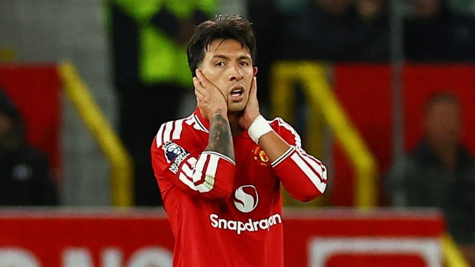 Manchester United's Lisandro Martinez looks dejected. (REUTERS)