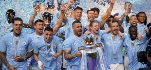 Man City fans party as Guardiola’s dominant team wins a record fourth-straight Premier League title